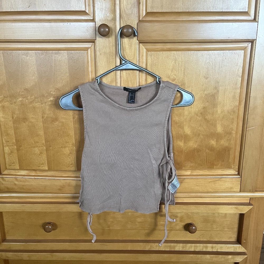 tan colored tank top